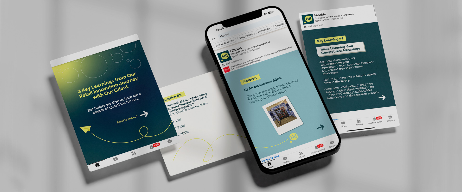 Teléfono móvil junto a material editorial impreso mostrando una interfaz web con tarjetas de contenido y diseño visual moderno.